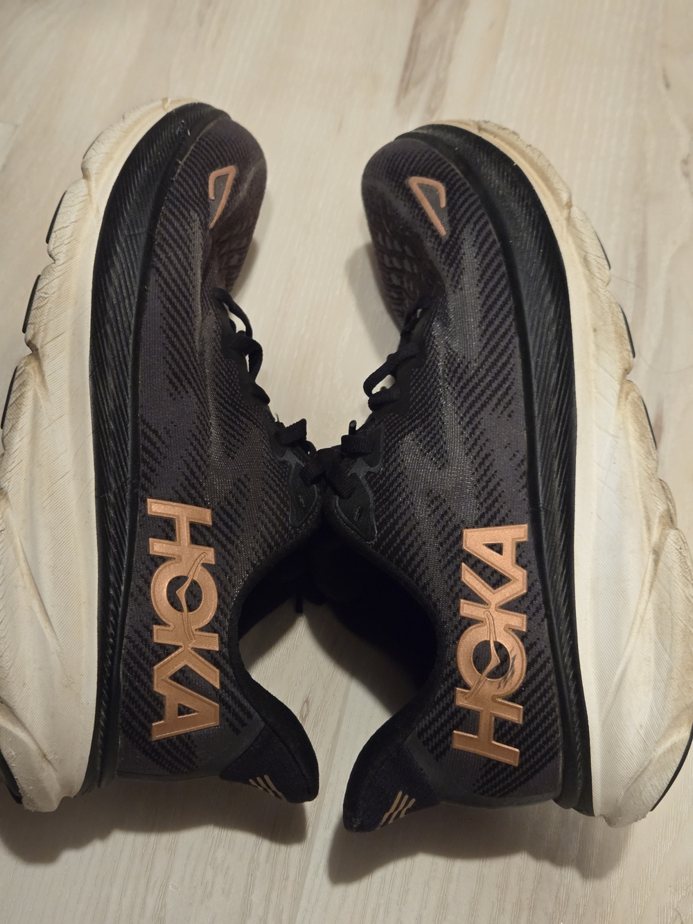 Hoka Men's Black Running Shoes with Copper Logo Accents